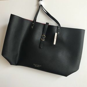 Victoria’s Secret tote with small makeup pouch.
